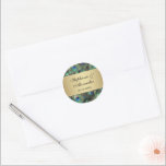 Golden Peacock Feather Wedding Classic Round Sticker<br><div class="desc">Wedding favor or envelope seal stickers. Elegant and refined peacock feather background in rich saturated colors of royal blue, copper gold, and teal emerald green. The peacock is a stately bird with ornamental feathers and it makes a beautiful display for a summer wedding or any occasion Metallic looking gold gradients...</div>