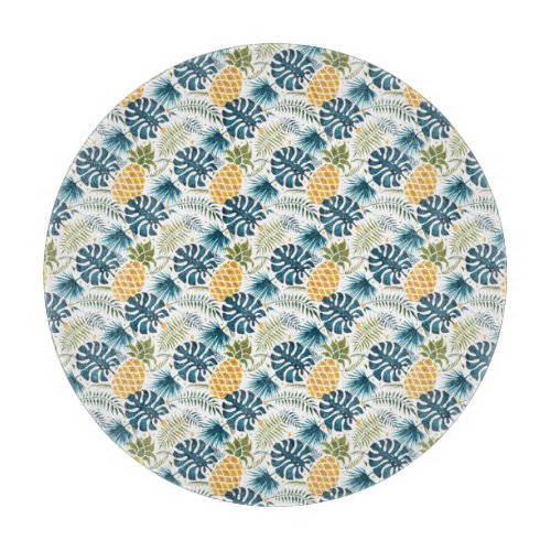 Golden pineapple blue palm leaves foliage white cutting board