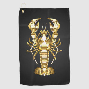 Golden polygonal lobster crawfish on black golf towel
