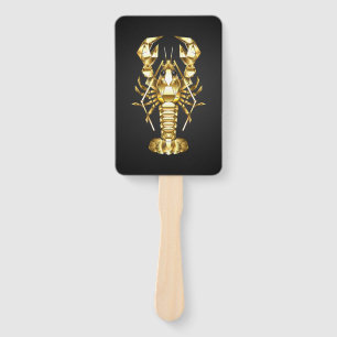 Golden polygonal lobster crawfish on black hand fan
