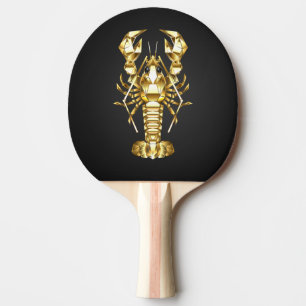 Golden polygonal lobster crawfish on black ping pong paddle