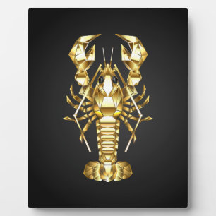 Golden polygonal lobster crawfish on black plaque