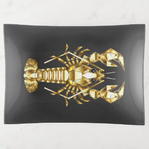 Golden polygonal lobster crawfish on black trinket tray