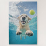 Golden Retriever Diving Tennis Ball Underwater Jigsaw Puzzle<br><div class="desc">The image shows a joyful Golden Retriever underwater, eagerly swimming towards a floating tennis ball. The dog's face is lit with excitement, with its mouth open and eyes focused on the ball. The crystal-clear water beautifully captures the playful moment, with sunlight streaming in from above, adding to the bright and...</div>
