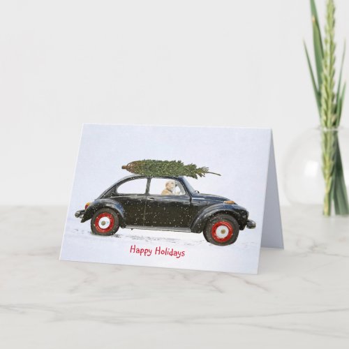 Golden Retriever dog in old car with holiday tree Card