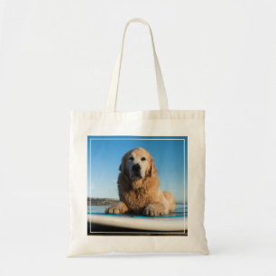 Golden Retriever Dog Laying On A Paddle Board Tote Bag
