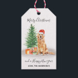 Golden Retriever Dog Santa Tree Merry Christmas Gift Tags<br><div class="desc">Add the finishing touch to gifts this holiday season with this Merry Christmas golden retriever gift tag santa dog with tree design, and matching decor. This golden retriever holiday gift tag features a watercolor dog with santa hat and a holiday tree. Personalize with family name . This golden retriever christmas...</div>