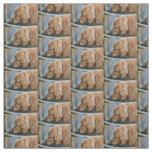 golden retriever drinking from a fountain in back fabric