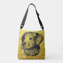 Golden retriever puppy portrait in black and gold crossbody bag