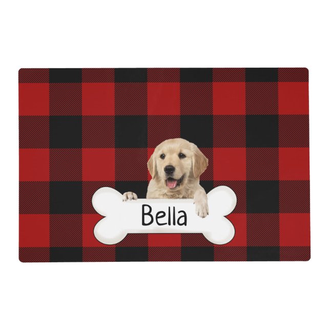 Golden retriever with bone on plaid placemat (Front)