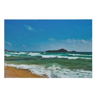 Golden sand beach rough sea blue sky