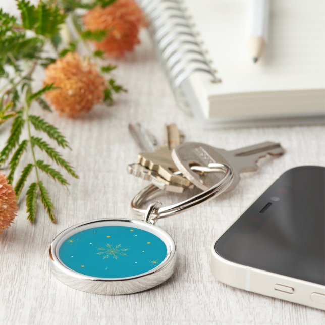 Golden snowflake keychain. keychain (Side)