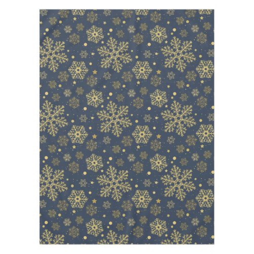 Golden snowflakes on navy tablecloth
