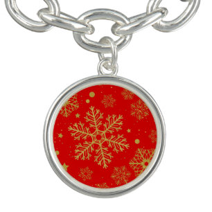 Golden snowflakes on red bracelet