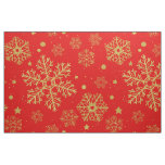 Golden snowflakes on red fabric
