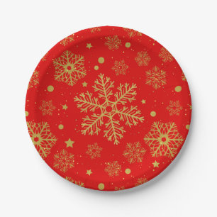 Golden snowflakes on red paper plates