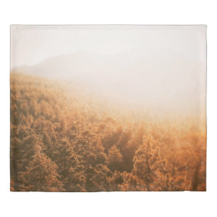 GOLDEN SUN OVER A FOREST DUVET COVER