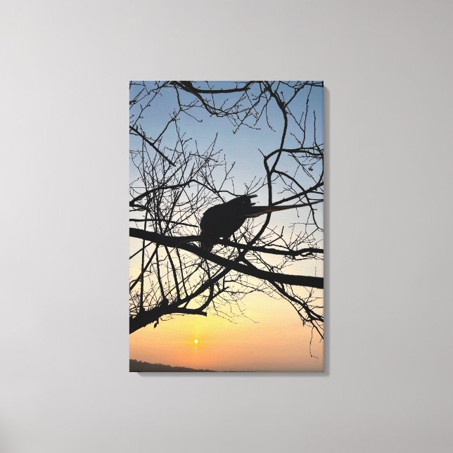 Golden Sunset Silhouette: Bird on Tree Branches Canvas Print (Front)