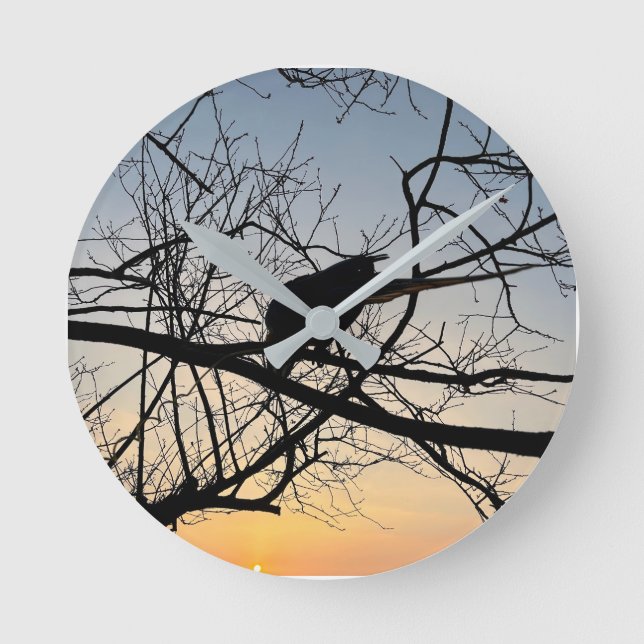 Golden Sunset Silhouette: Bird on Tree Branches Round Clock (Front)