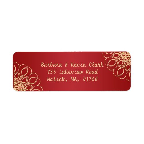 Golden swirls on dark red background label