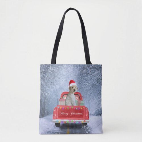 Goldendoodle Dog in Snow sitting in Christmas  Tote Bag