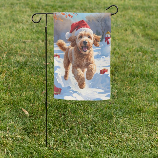 Goldendoodle Running in Snow with Christmas Hat Garden Flag (In SItu)