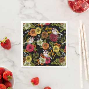 Goldfinches in the garden on black napkins