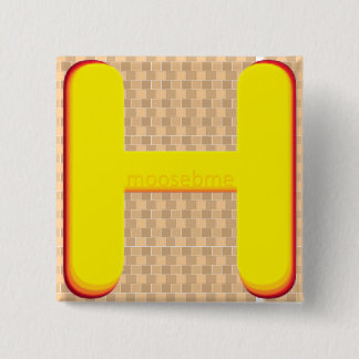 Golen Capitol "H" on Tan Thatch Button