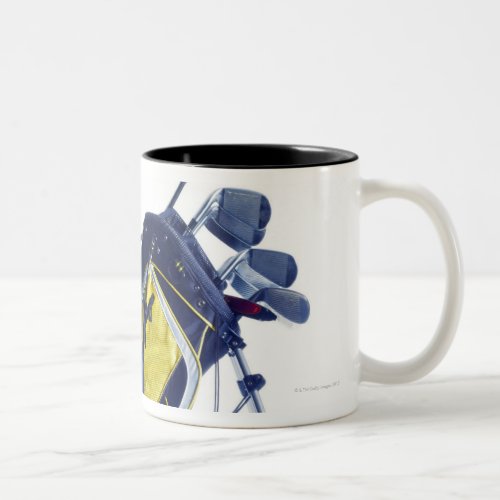 Golf bag with clubs on white background Two_Tone coffee mug