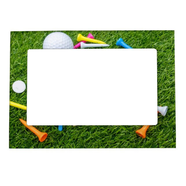 Golf ball and colourful tee are on green grass magnetic frame (Front)
