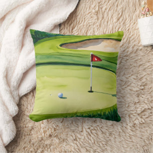 Golf ball and flag on putting green throw pillow