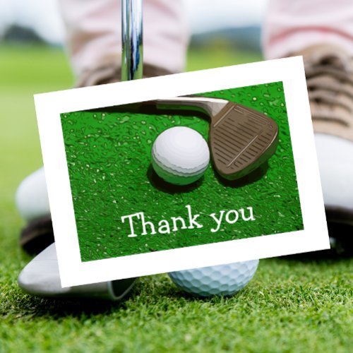 Golf ball and Iron on green Thank you card