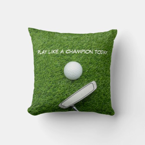 Golf ball and putter on green grass throw pillow