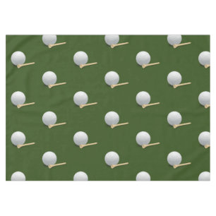 Golf ball and tee on green grass tablecloth