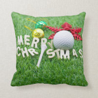Golf ball and tee with Christmas Ornament on green Throw Pillow