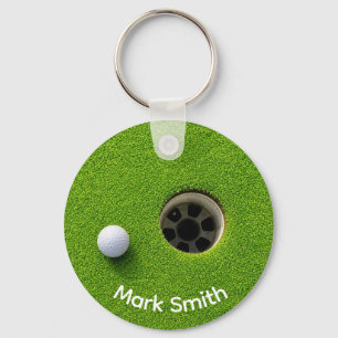 Golf Ball Next to Hole on Green Grass Golf Course Keychain