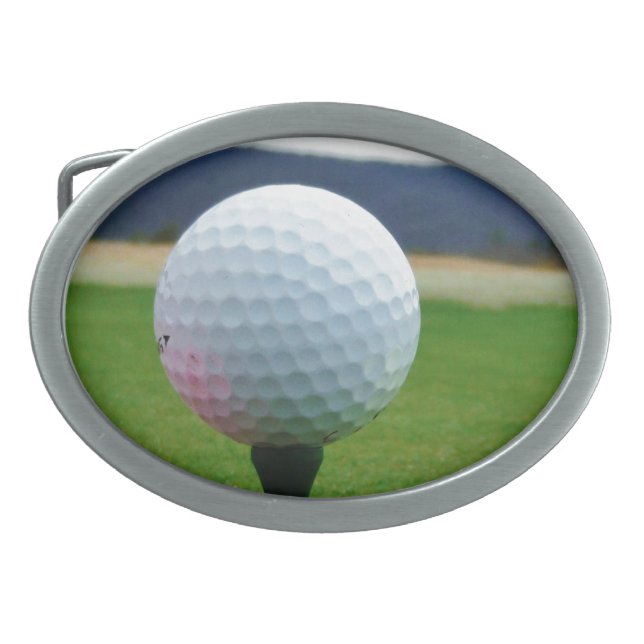 Golf Ball on a mountain golf course Oval Belt Buckle (Front)
