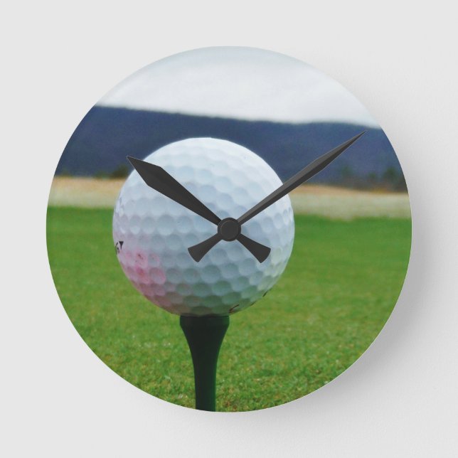 Golf Ball on a mountain golf course Round Clock (Front)