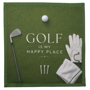 Golf ball on green grass cloth napkin