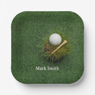 Golf ball on green grass for golfer paper plates
