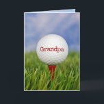 Golf Ball On Tee for Grandpa Card<br><div class="desc">Close up of golf ball on red tee in green grass for Grandpa's birthday.
Text on ball can be edited.</div>