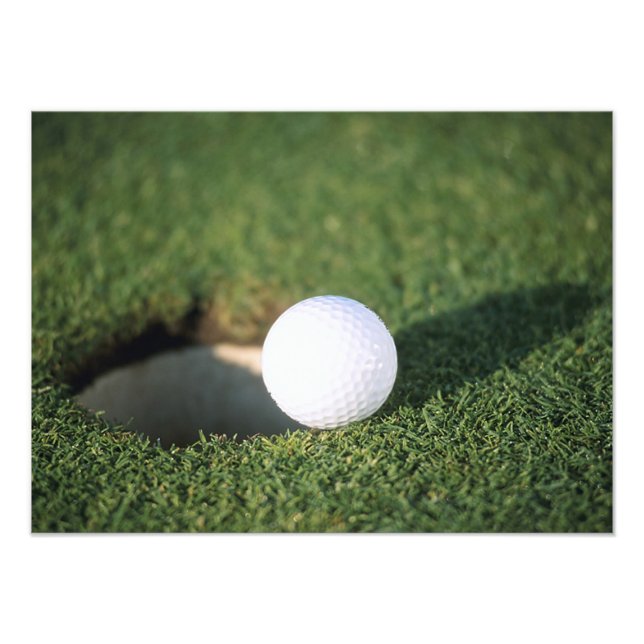 Golf Ball on the edge of hole Photo Print (Front)