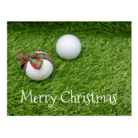Golf ball with Christmas ribbon on Christmas Postcard