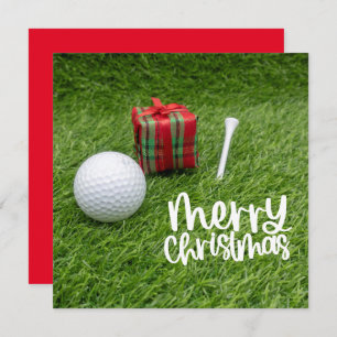 Golf ball with Christmas tee for golfer holiday