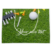 Golf ball with colourful tees on green grass large gift bag