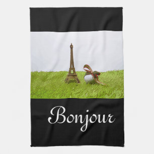 Golf ball with Eiffel Towel on green Bonjour