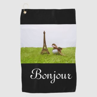 Golf ball with Eiffel Towel on green Bonjour