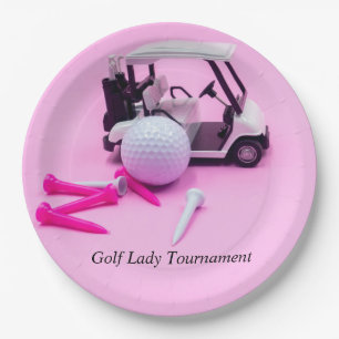 Golf ball with golf cart and pink tee on pink paper plates