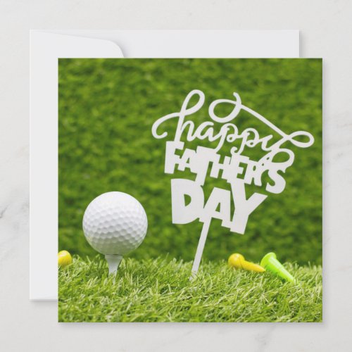 Golf ball with Happy Fathers Day sign on green  C Card