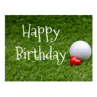 Golf ball with heart are on green grass postcard